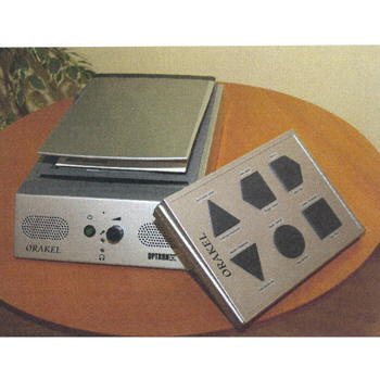 A table-top device with the shape and size of a standard scanner with speakers on the front face and knob control. An accompanying flat remote is also pictured. 