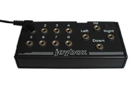 Top of JoyBox with 10 numbered switch ports and four direction switch ports up, left, right, and down.
