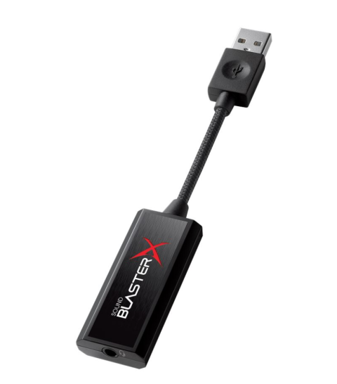 A small, dark grey USB device resembling a flash drive.