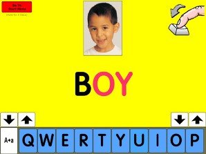 A bright yellow screen with an image of a child and the word "Boy" below in black and red font. A row of letters is at the bottom of the screen in blue, with two sets of up/down arrows on either side.
