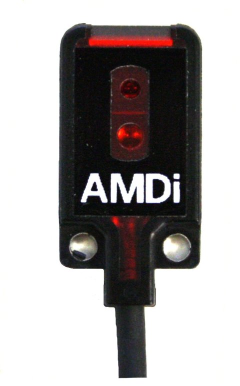A black rectangular device with a red light at the top and a cord on the bottom.