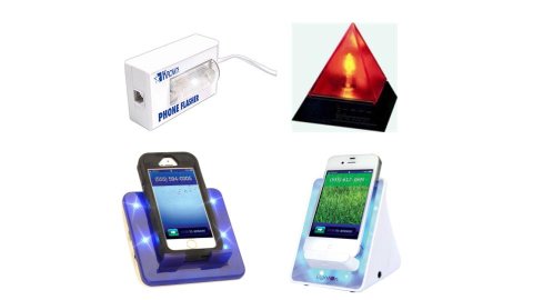Various models of flashing strobe devices that alert deaf or hard-of-hearing users when the phone rings. One device is a white, rectangular box with a clear LED strobe. Another is a red triangle strobe. The third and fourth models are base stands for smartphones that feature built-in cradles for the devices and built-in flashing light displays on the base.