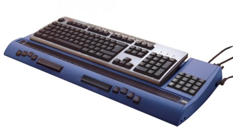 A blue Braille keyboard attached to a gray computer keyboard.