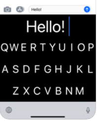 A partial iPhone with a black background and a QWERTY keyboard written in white capital letters. On the first line the word Hello! is written and followed by a blue cursor line.