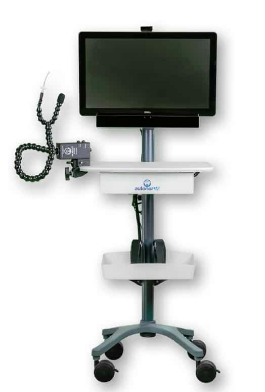A powered-off display screen on a rolling stand that has two integrated trays. At the side is shown a sip and puff system with tubing and a mounting clamp.