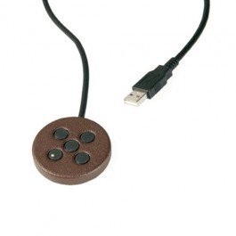 Small, round, copper-colored disc with five small buttons and a USB connector.