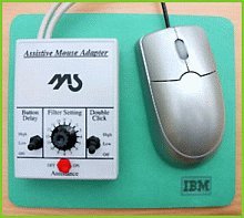 Silver IBM mouse and white Assistive Mouse Adapter with a red switch for Assistance. 