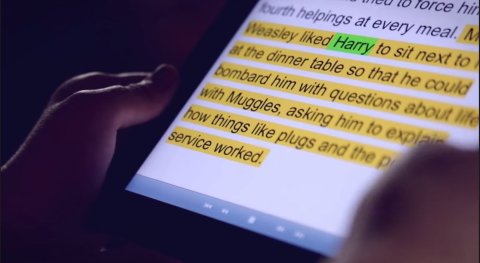 Read2Go on a tablet displaying text highlighted in yellow and the name "Harry" in light green.
