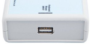 A small, rectangular device with USB port. 