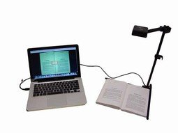 Free standing document camera connected to laptop.
