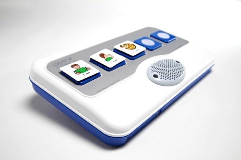 A rectangular white device that sits flat on a slight slant, similar to a keyboard, with a speaker at the bottom and five large picture icons along the top.