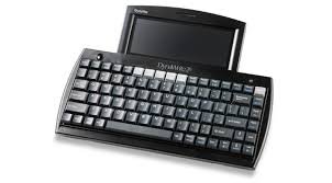 Keyboard with text viewing screen attached to top.