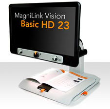 Video magnifier with words displayed on monitor screen. The device features a platform base for placing materials to be magnified.
