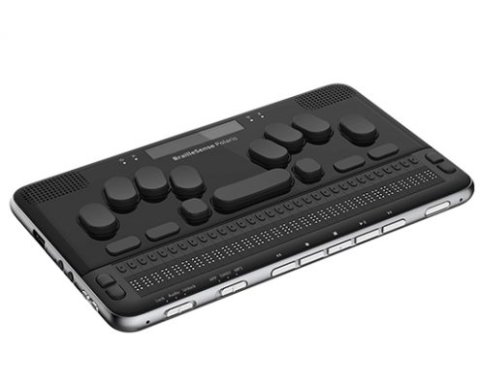 A black, rectangular device with black keys and black Braille cells.