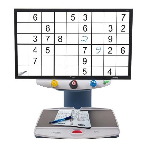 Large rectangular display showing a grid of six enlarged puzzles attached to a reading table/scanner.