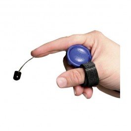 A side view of a hand holding a round switch mechanism connected to a strap around the thumb.