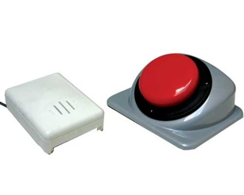 A large round red button on top of a silver rectangular base. There is a white rectangular receiver for the switch.