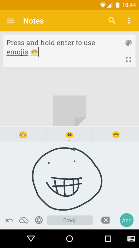 A hand drawn smiley face on the notes screen. Text displayed at the top of the screen reads "Press and hold enter to use emojis."