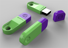 Three green USB sticks with purple tops.
