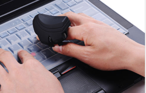 The finger mouse can be worn while typing.