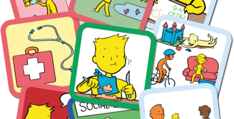Various multi-colored rectangular cards with cartoon drawings.