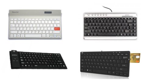 Various models of compact computer keyboards. They are all nearly identical to standard keyboards, except that they are missing numeric keypads on the right-hand side, and the keys are more compactly arranged. One model has a card reader slot on the upper right-hand corner. two are solid black. One model is black keys with light silver top and bottom borders. one is medium silver with light silver keys.