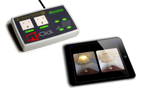 iPad connected to an iClick to control lighting in a room.
