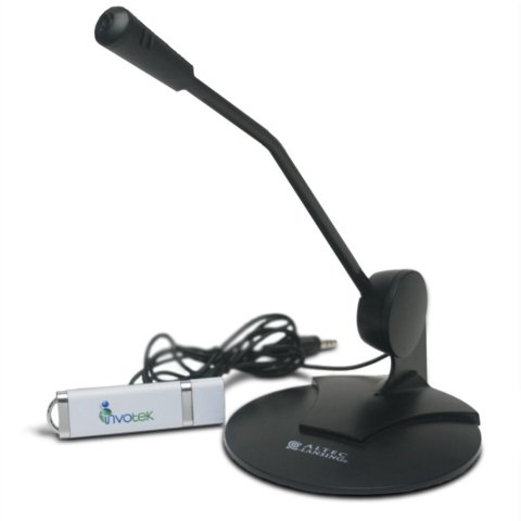 Black microphone with circular base, next to a black cord and small white component.