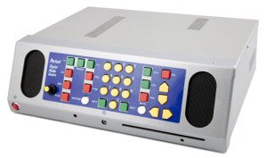Rectangular device with a control panel featuring key controls and front-facing speakers.