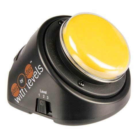 Black, round base with yellow button on top. The button base is sloped down toward the user.