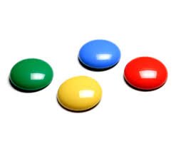 Small, round, button-style switches, shown here in green, yellow, blue, and red. 