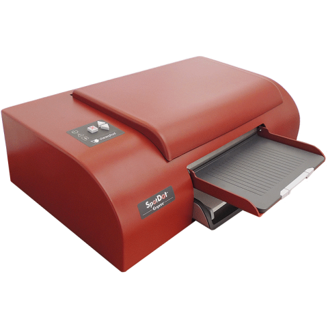 Red Braille printer with paper feeder tray on bottom.