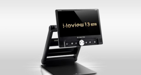 A medium-sized device with an LCD screen, attached to a kickstand with space beneath the screen for placing documents to magnify them. The device and stand are black.