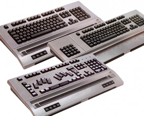 Three variations of keyboards, one with number pad on right, one with number pad on left, and third with keys laid out similar to natural finger position on keyboard and number pad on right.