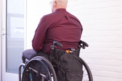 Three Echo Head sensor devices mounted to rear of wheelchair.