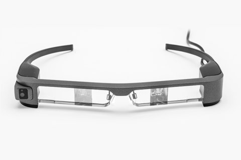 Wearable device resembling a pair of narrow goggles. The device is medium-grey in color.