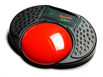 Bright, red, and round button mounted on a low-profile, oval, and black base.
