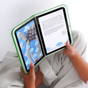 A child's hands holding a digital book. The book appears to be on a touchscreen device, which folds like a standard book.