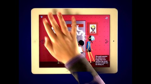 A hand tapping on the top-left corner of a touchscreen tablet, which is displaying an interactive digital book for children.