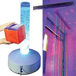 A long thin tube with light blue bubbles inside, a hand-sized red and purple cube, and an image of a room with pink and purple lighting.