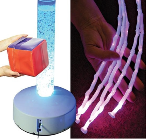 A long thin tube with light blue bubbles inside, a hand-sized red and purple cube, and an image of long thin white "tentacles," with pink lights.