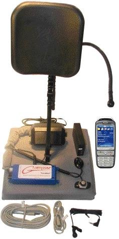 A wheelchair headrest shown with a mic attached so that it is positioned near the user's mouth. Beneath, various other included components are shown, including a smartphone. 