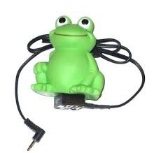 Green frog toy-like device connected to a standard cord and jack.
