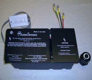 A medium-sized black device with three multi-colored cords attached.