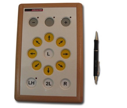 Overhead view of rectangular device with large buttons, yellow buttons with arrows arranged in a circle and additional controls along the top and bottom of device.