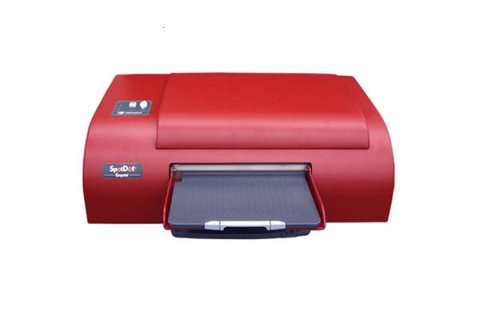 Low-profile, red desktop printer with a paper tray in front and a closed lid on top.