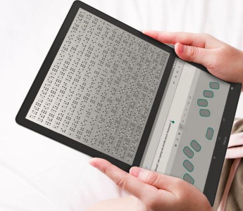 A tablet's screen divided into two parts. The upper portion shows Braille content while the lower has a small text box with a line of print and, below that, an 8 key + space bar key Braille keyboard.