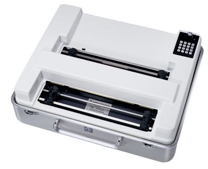 A white, rectangular device resembling a standard printer or embosser.