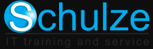 The company name "Schulze" is written with a blue print. The capital "S" is in white on a blue sphere. Below the name is written in small letters: IT training and service.