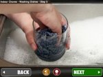 An image of someone washing a glass in the sink with their hands. Below, there are "back" and "next" menu buttons.